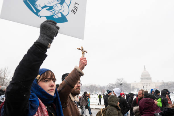 Demonstrators participate in the March For Life anti abortion rally in front of the US Capitol building in Washington, DC on January 19, 2024. This...