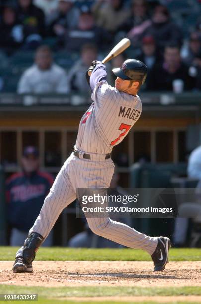Joe Mauer of the Minnesota Twins bats during a game against the Chicago White Sox at U.S. Cellular Field on April 8, 2007 in Chicago, Illinois.