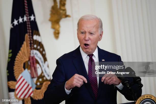 President Joe Biden speaks during an event with bipartisan mayors attending the U.S. Conference of Mayors Winter Meeting, in the East Room of the...