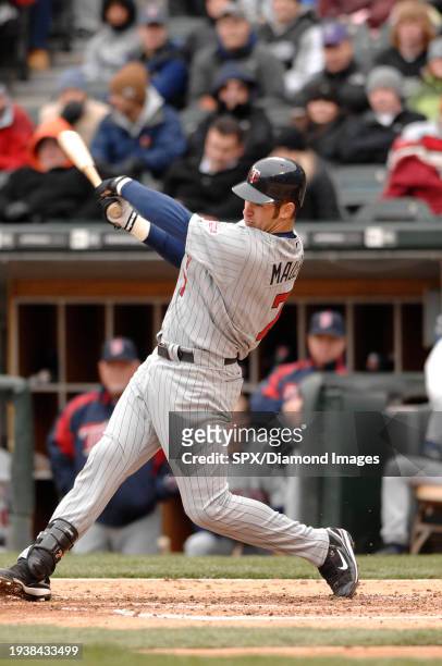 Joe Mauer of the Minnesota Twins bats during a game against the Chicago White Sox at U.S. Cellular Field on April 7, 2007 in Chicago, Illinois.