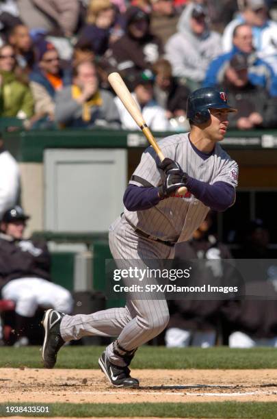 Joe Mauer of the Minnesota Twins bats during a game against the Chicago White Sox at U.S. Cellular Field on April 8, 2007 in Chicago, Illinois.