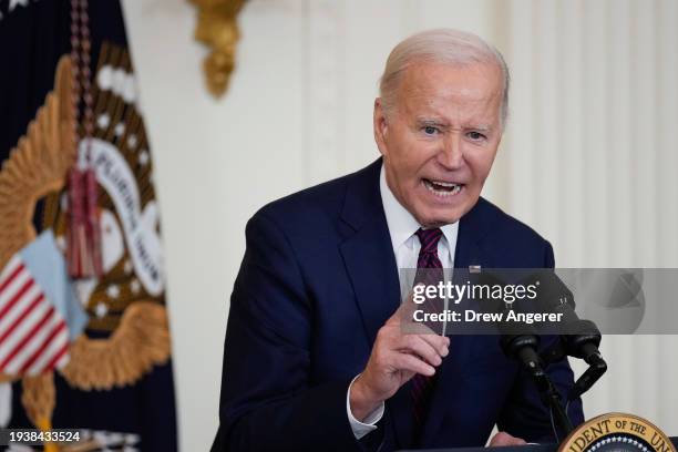 President Joe Biden speaks during an event with bipartisan mayors attending the U.S. Conference of Mayors Winter Meeting, in the East Room of the...