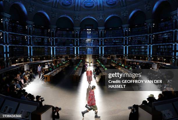 Models present creations for Kenzo Menswear Ready-to-wear Fall-Winter 2024/2025 collection as part of the Paris Fashion Week, in the Salle Ovale of...