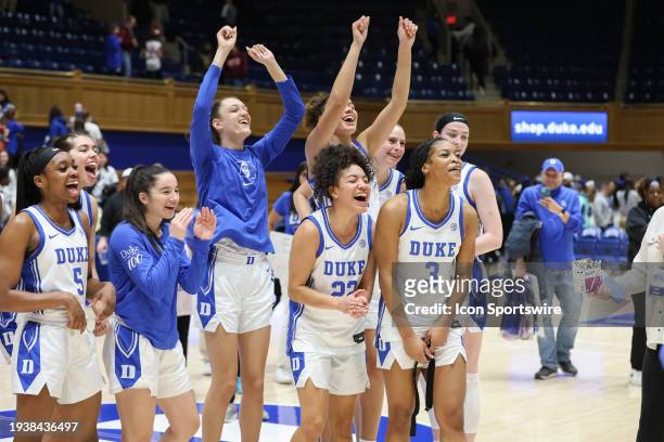 The team cheers as Duke Blue Devils guard Jadyn Donovan interviews after the college basketball game between the Duke Blue Devils and the Virginia...