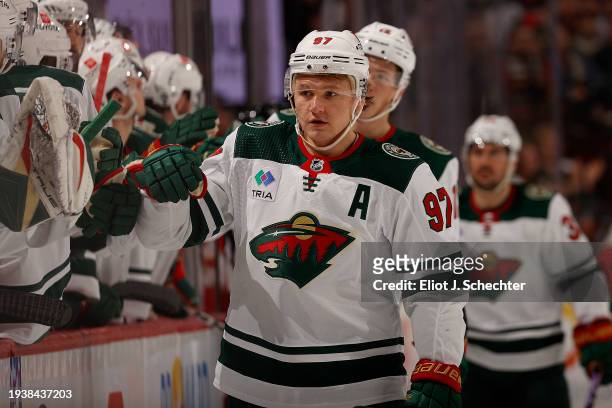 Kirill Kaprizov of the Minnesota Wild celebrates his goal with teammates during the first period against the Florida Panthers at the Amerant Bank...