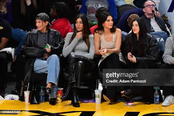 Hailey Bieber, Sarah Staudinger and Kendall Jenner attend a basketball game between the Oklahoma City Thunder and Los Angeles Lakers on January 15,...
