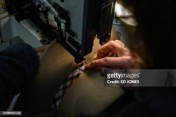 Finishing touches are added to a hat at the Montcapel millinery on January 15, 2024. The Montcapel millinery, saved from the scrap heap by an...