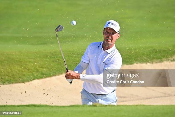 Mike Weir of Canada plays from abunker on the 16th hole during the second round of the PGA TOUR Champions Mitsubishi Electric Championship at...