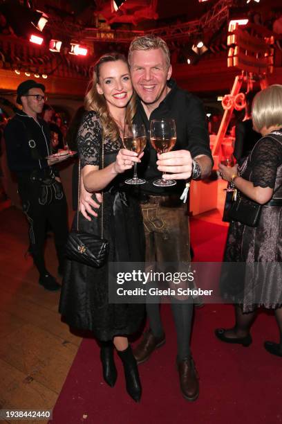 Deborah Müller and Oliver Hill during the 31st Weißwurstparty at Hotel Stanglwirt on January 19, 2024 in Going near Kitzbuehel, Austria.