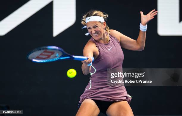 Victoria Azarenka of Belarus in action against Jelena Ostapenko of Latvia in the third round on Day 7 of the 2024 Australian Open at Melbourne Park...