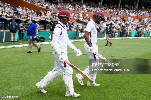 Tagenarine Chanderpaul of West Indies and Tagenarine Chanderpaul of West Indies head out to bat during day one of the First Test in the Mens Test...