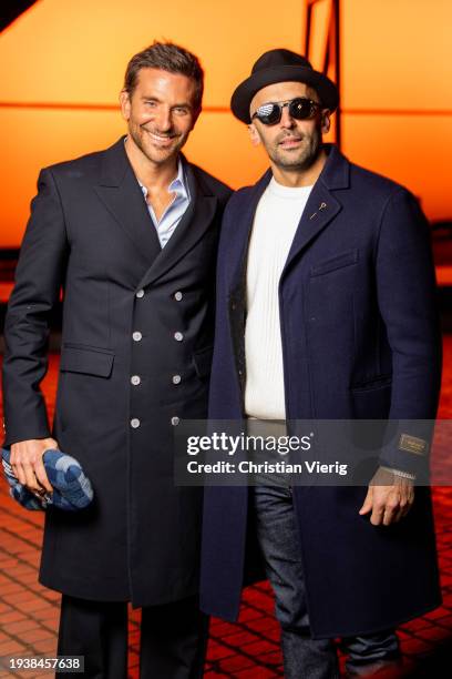 Bradley Cooper & JR are seen outside Louis Vuitton during the Menswear Fall/Winter 2024/2025 as part of Paris Fashion Week on January 16, 2024 in...