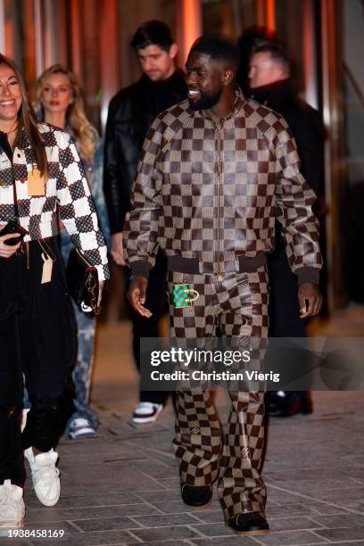 Samuel Umtiti is seen outside Louis Vuitton during the Menswear Fall/Winter 2024/2025 as part of Paris Fashion Week on January 16, 2024 in Paris,...