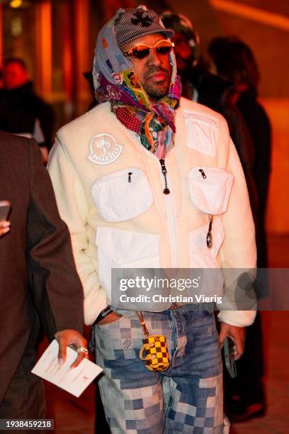 Guest is seen outside Louis Vuitton during the Menswear Fall/Winter 2024/2025 as part of Paris Fashion Week on January 16, 2024 in Paris, France.