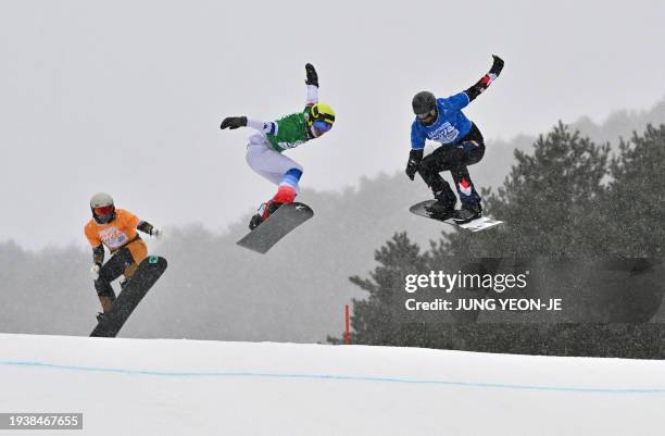 S Mason Hamel , France's Benjamin Niel and Japan's Daisuke Muraoka compete in the small final of the men's snowboard cross during the Gangwon 2024...