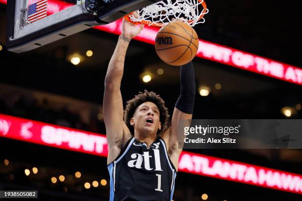 Jalen Johnson of the Atlanta Hawks scores over the San Antonio Spurs during the first half at State Farm Arena on January 15, 2024 in Atlanta,...