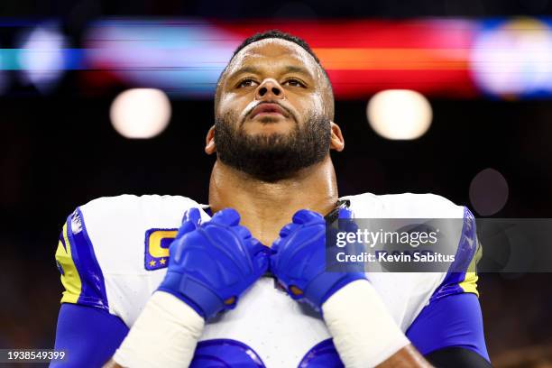 Aaron Donald of the Los Angeles Rams stands on the sidelines during the national anthem prior to an NFL wild-card playoff football game against the...