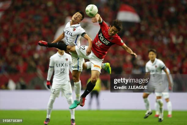 Yuma Suzuki of Kashima Antlers and Yuki Abe during the J.League Championship Final second leg match between Urawa Red Diamonds and Kashima Antlers at...