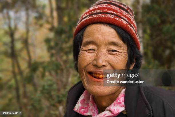 beetlenut smile - bhutan stock pictures, royalty-free photos & images