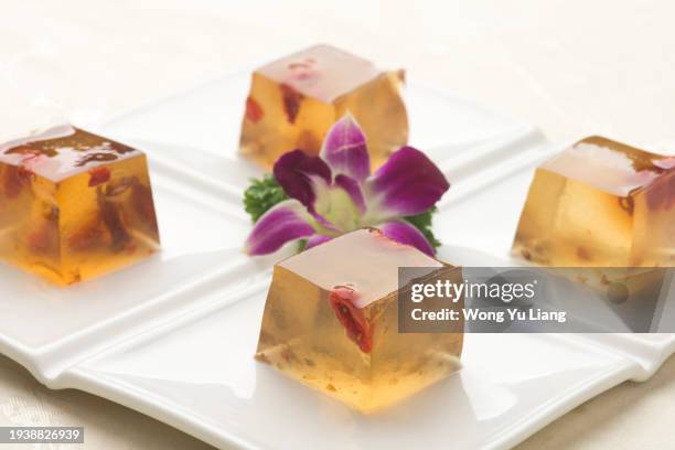 chinese osmanthus flower jelly with goji berry - gel de ágar - fotografias e filmes do acervo