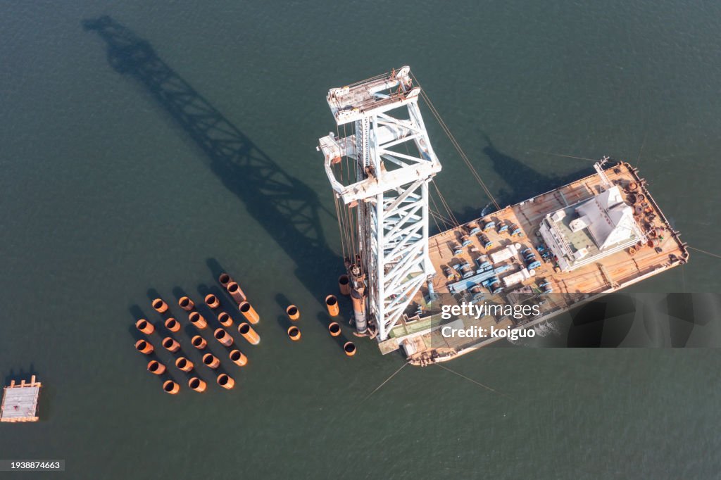 Aerial view of piling ship at sea