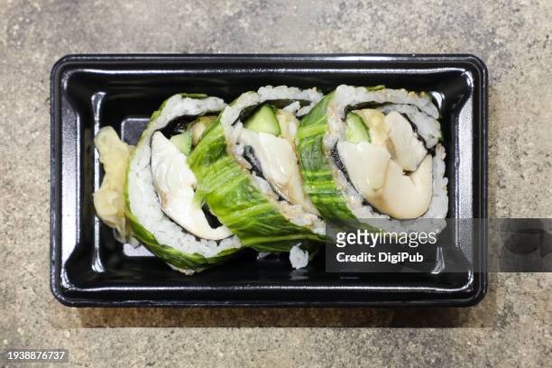 savory shimé saba hiroshima-na maki sushi takeout - saba sushi stock pictures, royalty-free photos & images