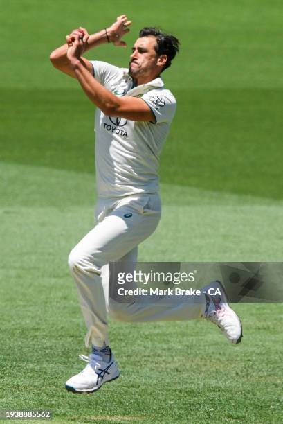 Mitchell Starc of Australia bowls during day one of the First Test in the Mens Test match series between Australia and West Indies at Adelaide Oval...