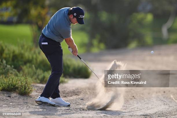 Eddie Pepperell of England plays his third shot on the 10th hole during the Pro-Am prior to the Hero Dubai Desert Classic at Emirates Golf Club on...