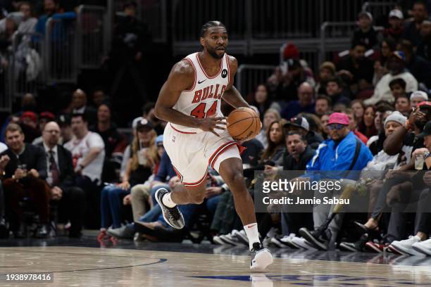 Patrick Williams of the Chicago Bulls controls the ball against the Golden State Warriors on January 12, 2024 at United Center in Chicago, Illinois....