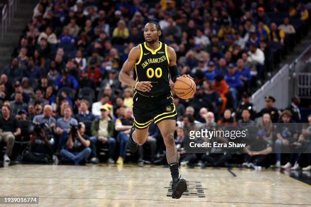 Jonathan Kuminga of the Golden State Warriors dribbles the ball against the New Orleans Pelicans at Chase Center on January 10, 2024 in San...
