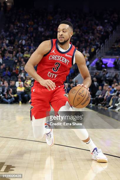 McCollum of the New Orleans Pelicans dribbles the ball against the Golden State Warriors at Chase Center on January 10, 2024 in San Francisco,...