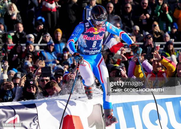 France's Cyprien Sarrazin reacts after the first run of the Men's Downhill event of FIS Alpine Skiing World Cup in Kitzbuehel, Austria on January 20,...