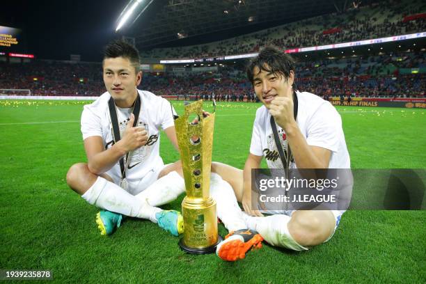 Yuma Suzuki and Mu Kanazaki of Kashima Antlers celebrate the J.League J1 Champions following the 2-2 away goal victory in the J.League Championship...