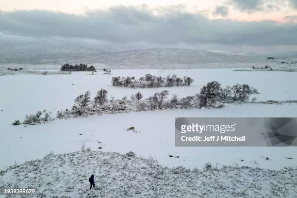 View of a frozen Lochan na Achlaise on January 17, 2024 in Rannoch Moor, Scotland. The UK is in the grip of a cold spell, with Arctic air sweeping in...