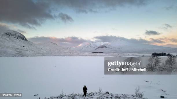 View of a frozen Lochan na Achlaise on January 17, 2024 in Rannoch Moor, Scotland. The UK is in the grip of a cold spell, with Arctic air sweeping in...