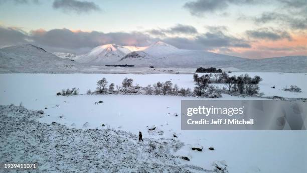 View of a frozen Lochan na Achlaise on January 17, 2024 in Rannoch Moor, Scotland. The UK is in the grip of a cold spell, with Arctic air sweeping in...