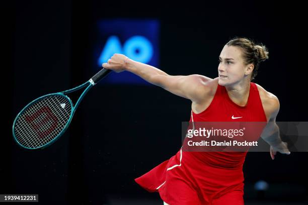 Aryna Sabalenka plays a backhand in their round two singles match against Linda Fruhvirtova of the Czech Republic during the 2024 Australian Open at...