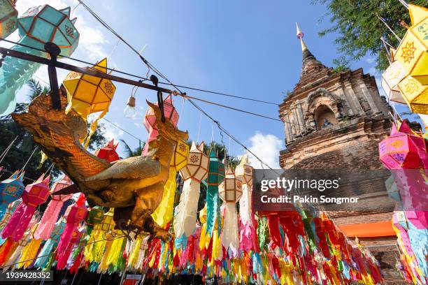 colorful lamp festival and lantern in loi krathong at wat lok moli is a beautiful old temple in chiang mai, chiag mai province, thailand - chiang mai province stock-fotos und bilder