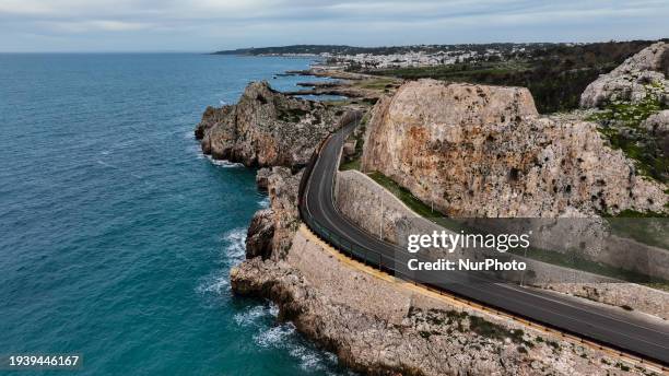 Drone view of the Split Mountain in Santa Maria al Bagno, Italy, on January 19, 2024. The split mountain is encountered along the coastal road that...