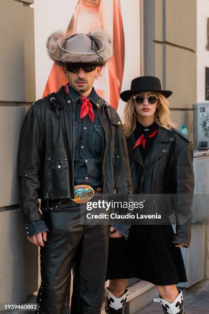 Guests wear blue denim shirt, black leather jacket and black leather pants, cowboy belt and taupe cowboy hat , and black leather jacket, black skirt,...