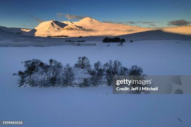 View of a frozen Lochan na Achlaise on January 17, 2024 in Rannoch Moor, Scotland. The UK is in the grip of a cold spell, with Arctic air sweeping in...