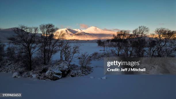 View of a frozen Lochan na Achlaise on January 17, 2024 in Rannoch Moor, Scotland. The UK is in the grip of a cold spell, with Arctic air sweeping in...