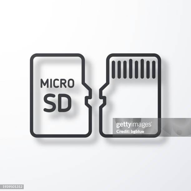micro sd card - front and back view. line icon with shadow on white background - computer chip close up stock illustrations