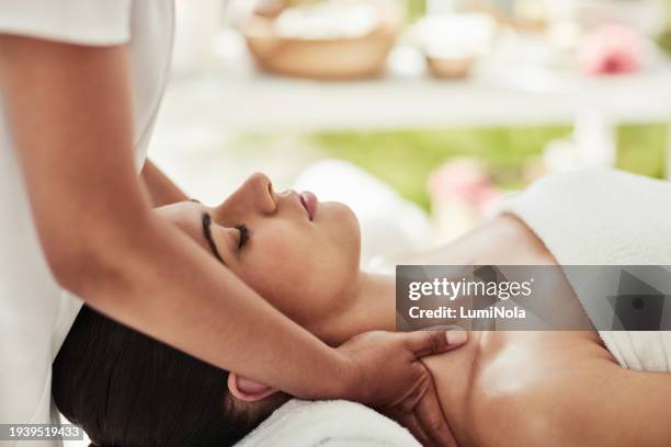Calm, shoulder massage and woman at spa for health, wellness and luxury beauty treatment for relaxing. Peace, body care and young female person with natural therapy routine for rest at cosmetic salon