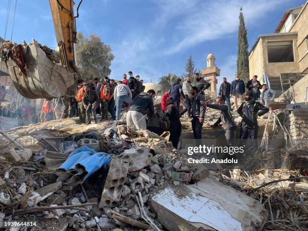 Heavy duty machine removes debris of a destroyed building after Israel's airstrike, which killed 4 commander of Islamic Revolutionary Guard Corps...