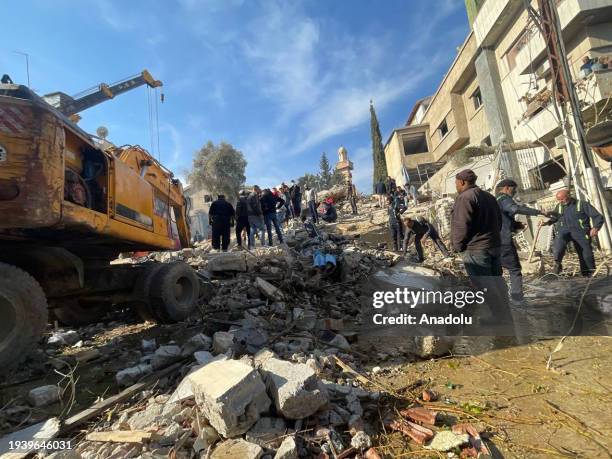 Heavy duty machine removes debris of a destroyed building after Israel's airstrike, which killed 4 commander of Islamic Revolutionary Guard Corps...
