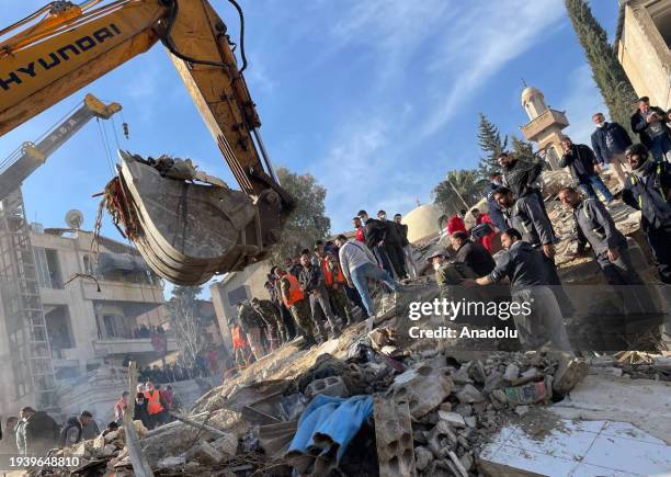 Heavy duty machine removes debris of a destroyed building after Israel's airstrike, which killed 4 commander of Islamic Revolutionary Guard Corps...