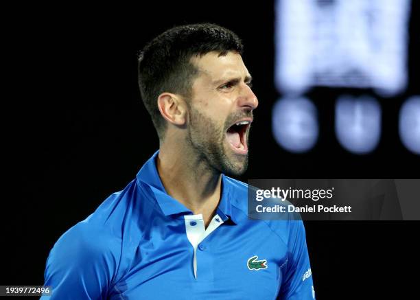 Novak Djokovic of Serbia celebrates match point in their round two singles match against Alexei Popyrin of Australia during the 2024 Australian Open...