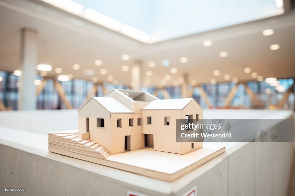 Wooden model house in office