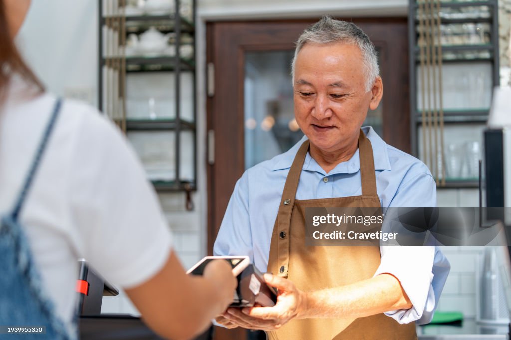 Coffee Shop Elegance: Wireless Payments, Entrepreneurial Spirit, and Digital Connectivity.